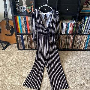 Black & White Striped Jumpsuit. Long sleeve.